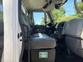 A 2008 International DuraStar interior showing the driver's seat dashboard and first aid kit on the floor