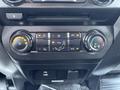 Dashboard controls of a 2017 Ford F-550 featuring climate control dials and buttons for air conditioning and fan settings