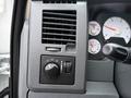 Interior controls of a 2008 Sterling Bullet including a dial for headlights and a series of gauges displaying speed and other metrics
