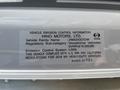 A label displaying vehicle emission control information for a 2018 Hino 195 including vehicle family name and regulatory details