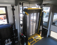 Interior view of a 2020 Chevrolet Express showing a wheelchair lift in the foreground