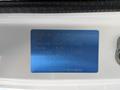 A blue identification plate from a 2009 Suzuki Carry displaying details such as type chassis number engine color and manufacturer information