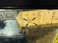 A control panel with various symbols and instructions for operating a 2022 Caterpillar 306 excavator