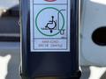 A label on a device indicating it is for wheelchair use with a maximum load capacity of 800 pounds or 364 kilograms