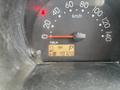 Dashboard of a 2010 Daihatsu Hijet showing speedometer and fuel gauge with odometer reading 49720