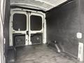 Interior of a 2022 Ford Transit cargo van showing empty space with no visible cargo or equipment
