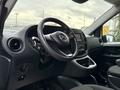 Interior view of a 2020 Mercedes-Benz Metris highlighting the steering wheel dashboard and controls