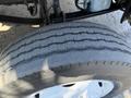 Close-up of a tire from a 2017 Freightliner M2 106 showing tread patterns and sidewall details
