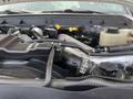 2014 Ford F-250 SD engine with visible components like hoses and wiring in the engine bay designed for heavy-duty performance