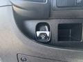 Close-up of a 2022 RAM Promaster 350 interior showing the electronic parking brake control labeled as "PULL ON"