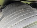 Close-up of a tire on a 2019 Ford F-750 showing tread wear and surface details