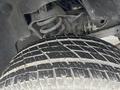 A close-up view of a tire on a 2006 Dodge Ram 2500 showing tread depth and texture