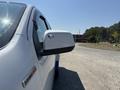 2017 Chevrolet Colorado pickup truck showing the side mirror and a portion of the driver's door with a DuraMax Diesel badge
