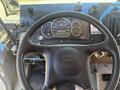 Steering wheel and dashboard of a 2009 Workhorse W62 showing speedometer and other gauges