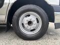 Close-up of a silver wheel with a Goodyear tire, showing the wheel rim and tire tread pattern of a 2020 Chevrolet Express