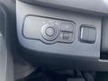 Dashboard controls of a 2025 Mercedes-Benz Sprinter with buttons for light settings and other features
