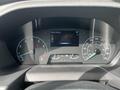Dashboard of a 2023 Ford Transit featuring a digital display with gauges for speed fuel and driver assist information