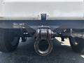 A close-up view of the rear hitch of a 2017 Chevrolet Colorado with a metal tow hook attached