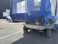 A 2023 Bitimec SC415 cleaning machine featuring a blue body with a transparent compartment and two front lights on its lower frame