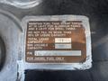 A metal plaque with maintenance instructions for a fuel tank on a 2008 Peterbilt 340 including torque specifications and capacity details for diesel fuel