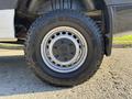 A close-up of a 2024 Mercedes-Benz Sprinter 2500 wheel featuring a silver rim and all-terrain tire design