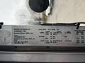 A 2018 Ford E-450 vehicle identification label with information including manufacturer details and weight specifications