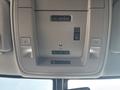 Interior overhead console of a 2017 Chevrolet Silverado 1500 featuring light controls and various buttons for functions like door and sunroof operation