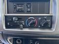 The control panel of a 2020 Hino 338 features various dials for climate control including air conditioning and fan settings