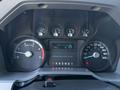 Speedometer and dashboard display of a 2010 Ford F-450 showing various gauges for speed rpm fuel and engine temperature