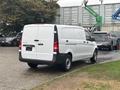 A 2021 Mercedes-Benz Metris van in white with a rear view showing its sleek design and spacious cargo area