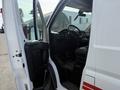 A 2017 RAM Promaster with an open driver's side door revealing the interior and dashboard