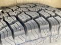 Close-up of a tire tread from a 2025 Mercedes-Benz Sprinter showing deep grooves and patterns designed for traction and stability on various surfaces