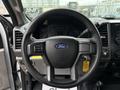 Steering wheel of a 2018 Ford F-550 featuring the Ford logo and control buttons