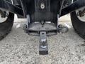 The image shows the hitch of a 2009 New Holland T4020 tractor featuring a ball mount and adjustable height settings