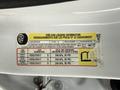 Tire and loading information label for a GMC Sierra 1500 detailing occupant capacity tire sizes and pressure for front and rear tires