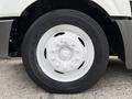 Close-up of a white wheel with a Goodyear tire on a 2012 International TerraStar vehicle