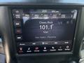 Screen display in a 2021 RAM 5500 showing a radio station tuned to 101.1 FM featuring classic rock music by Van Halen