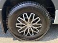 Close-up of a black wheel with a shiny multi-spoke rim and a thick tire labelled Winda WA80