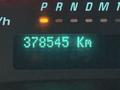 The image shows the digital odometer of a 2019 Chevrolet Express displaying a reading of 378545 kilometers