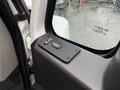 Control panel with buttons for locking and unlocking the doors of a 2014 International TerraStar vehicle