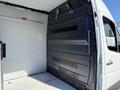 A 2017 Mercedes-Benz Sprinter van with an empty cargo area showing bare walls and flooring