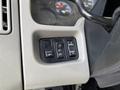 Control panel with buttons for lights and features in a 2012 International DuraStar 4300 cab