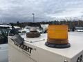 A 2005 Katolight SED60FPJ4 generator featuring a yellow beacon light and a vent pipe on top of the unit