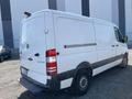 2016 Mercedes-Benz Sprinter cargo van with a white exterior and a sliding door on the side