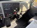 Interior dashboard of a 2008 International 7500 showing controls gauges and storage compartments