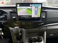 The image shows the interior dashboard of a 2023 Ford Transit featuring a large touchscreen display with a rearview camera and parking assistance graphics