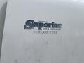 A 2006 Freightliner M2 106 displaying a logo for Superior Tank and Fabrication with a contact number and location in Tolleson AZ