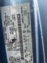 A 2009 Ford Econoline vehicle identification number label detailing specifications and model information