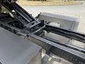 Close-up view of the chassis and suspension components of a 2020 Chevrolet Silverado showcasing the sturdy frame and mechanical parts