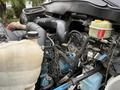2006 International 4200 engine showing various components including hoses tanks and wiring harnesses